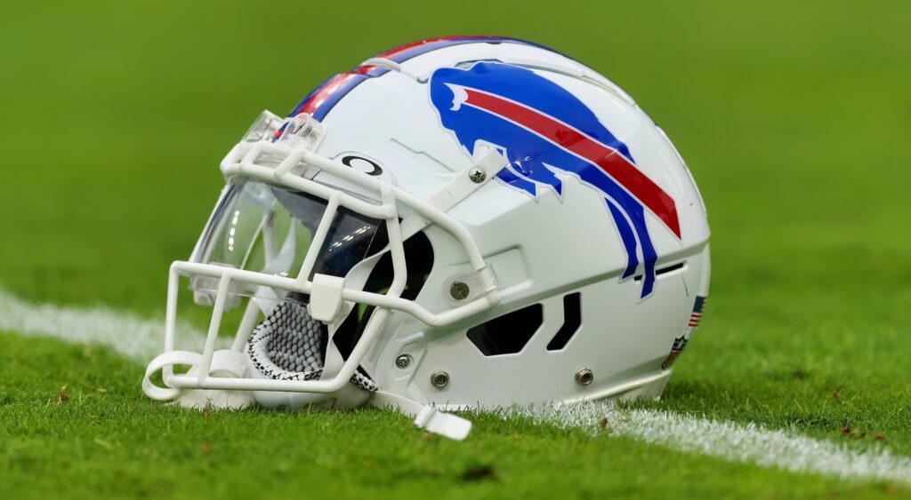 Buffalo Bills helmet shown on field. Von Miller has been suspended four games.