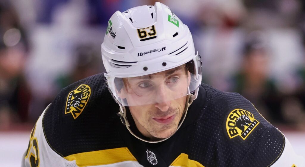 Brad Marchand of Boston Bruins looking on.