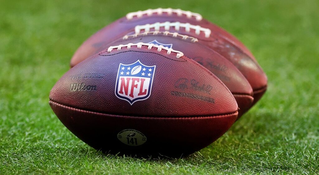 NFL Footballs on field