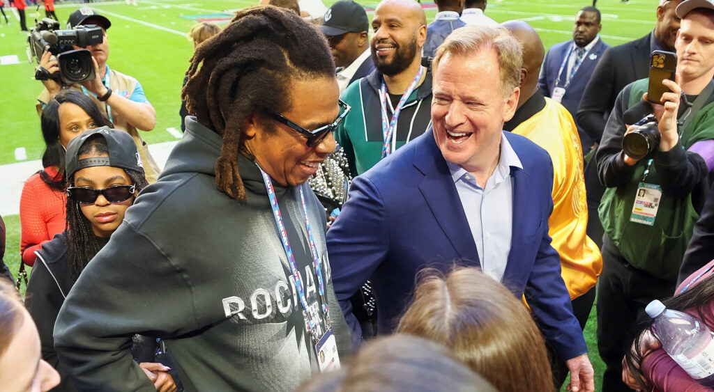 Photo of Roger Goodell laughing with Jay-Z for article on the Super Bowl Halftime Show