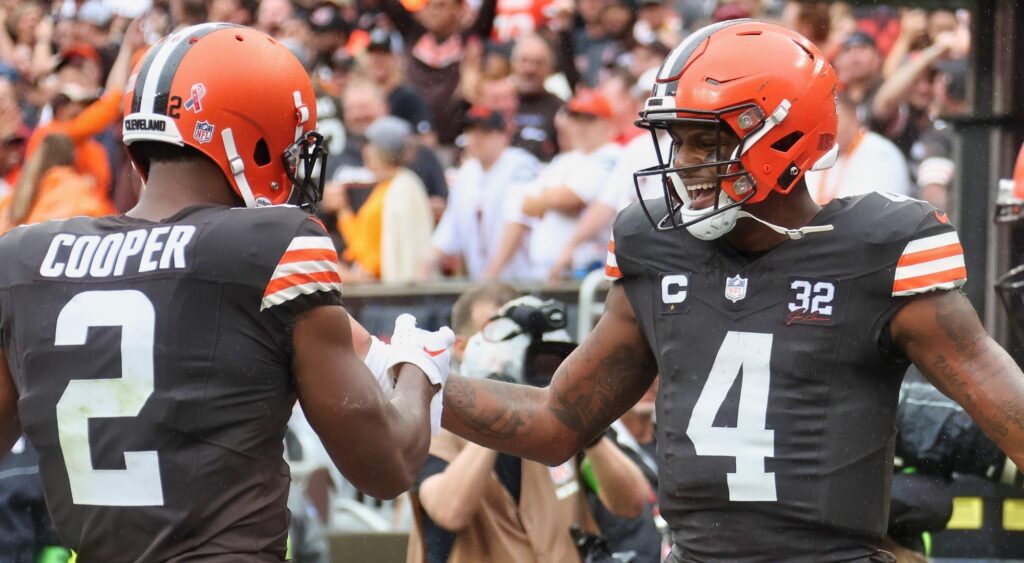 Amari Cooper and Deshaun Watson celebrating a play.