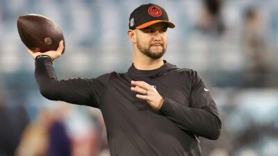 AJ McCarron throwing football