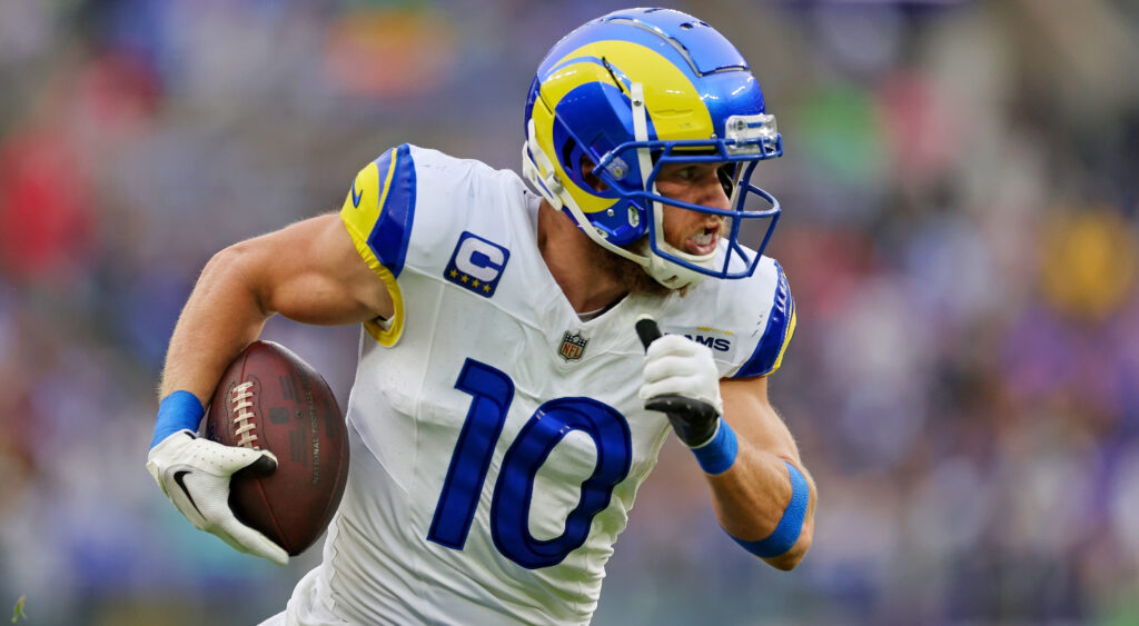 Cooper Kupp running with a football