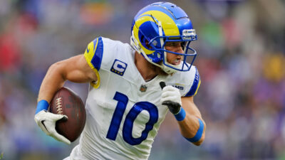 Cooper Kupp running with a football