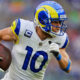 Cooper Kupp running with a football