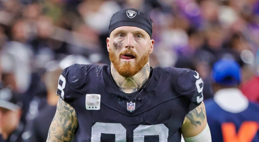 Maxx Crosby of Las Vegas Raiders looking on.