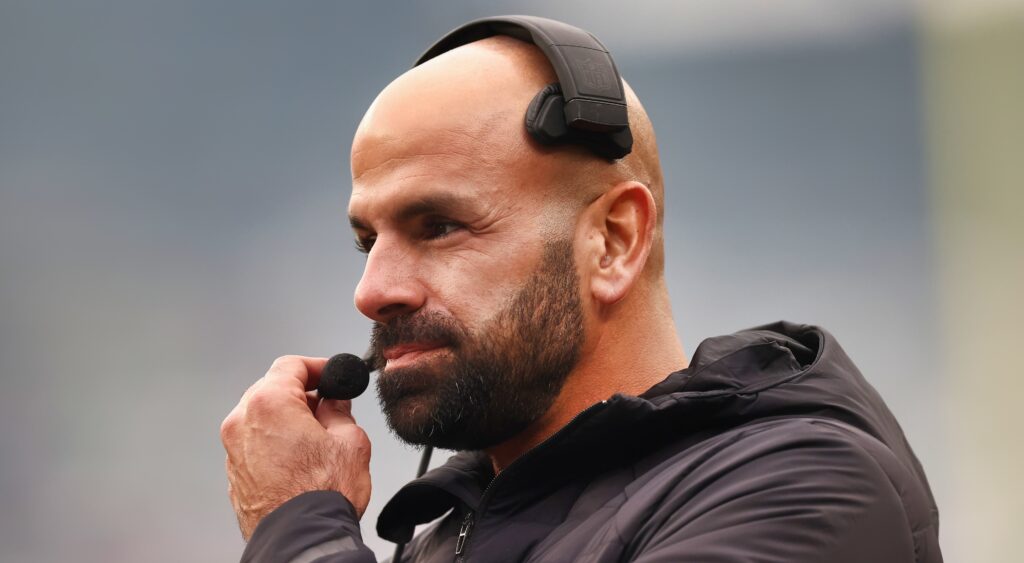 Robert Saleh with headset on