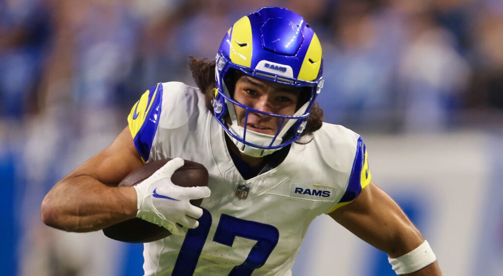 Puka Nacua running with football