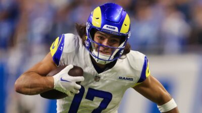 Puka Nacua running with football