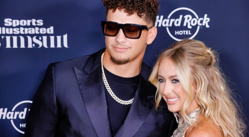 Patrick Mahomes and Brittany Mahomes posing