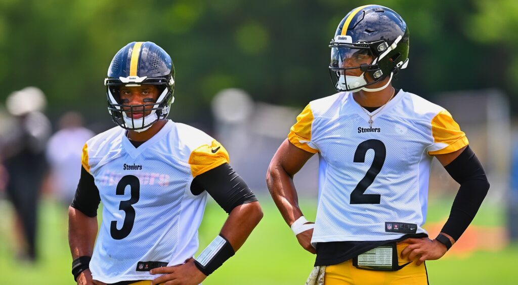 Russell Wilson and Justin Fields at practice.