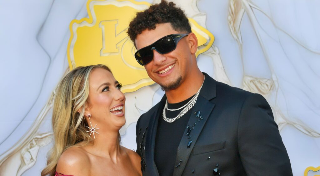 Brittany and Patrick Mahomes pose on the red carpet.