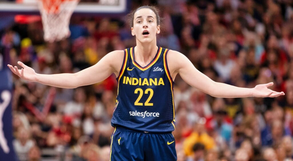 Caitlin Clark playing basketball