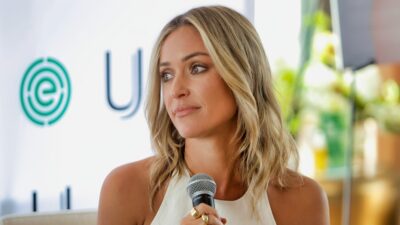 Kristin Cavallari speaking to people while seated