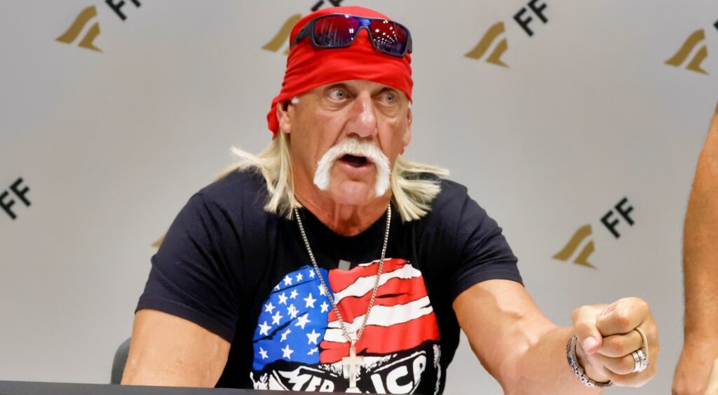 Hulk Hogan speaking at event.