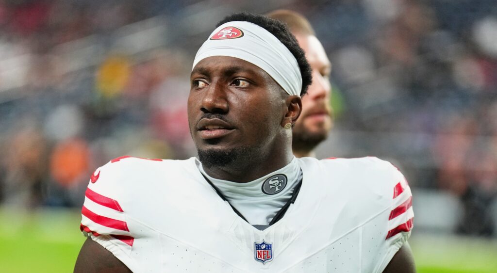 Deebo Samuel of San Francisco 49ers looking on.