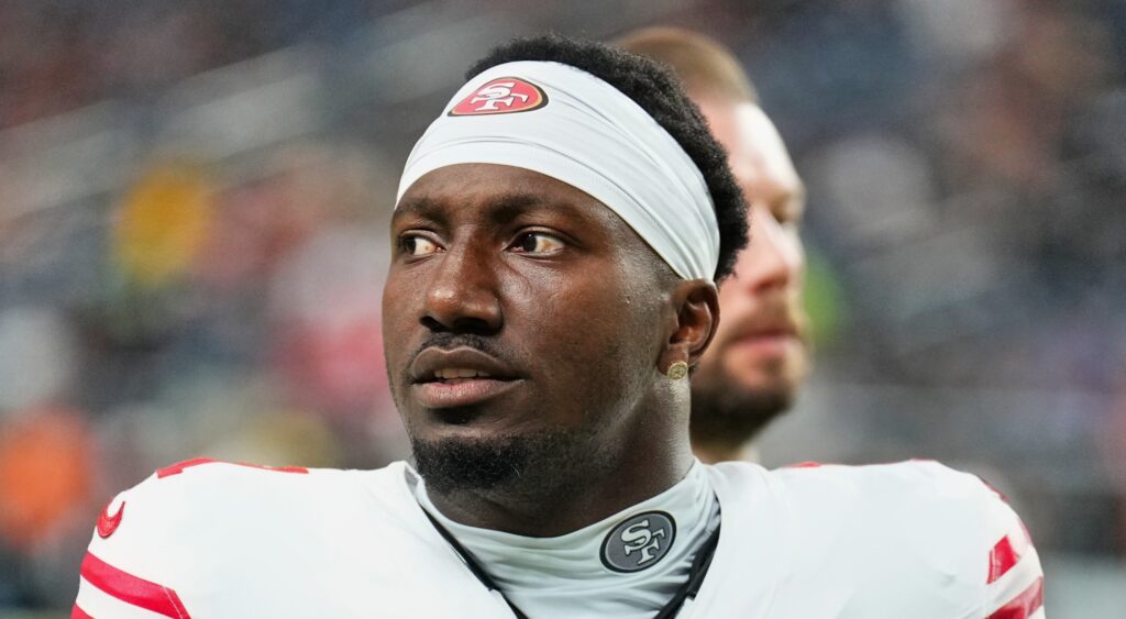 Deebo Samuel of San Francisco 49ers looking on.