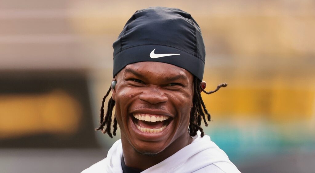 Travis Hunter of Colorado Buffaloes smiling during game.