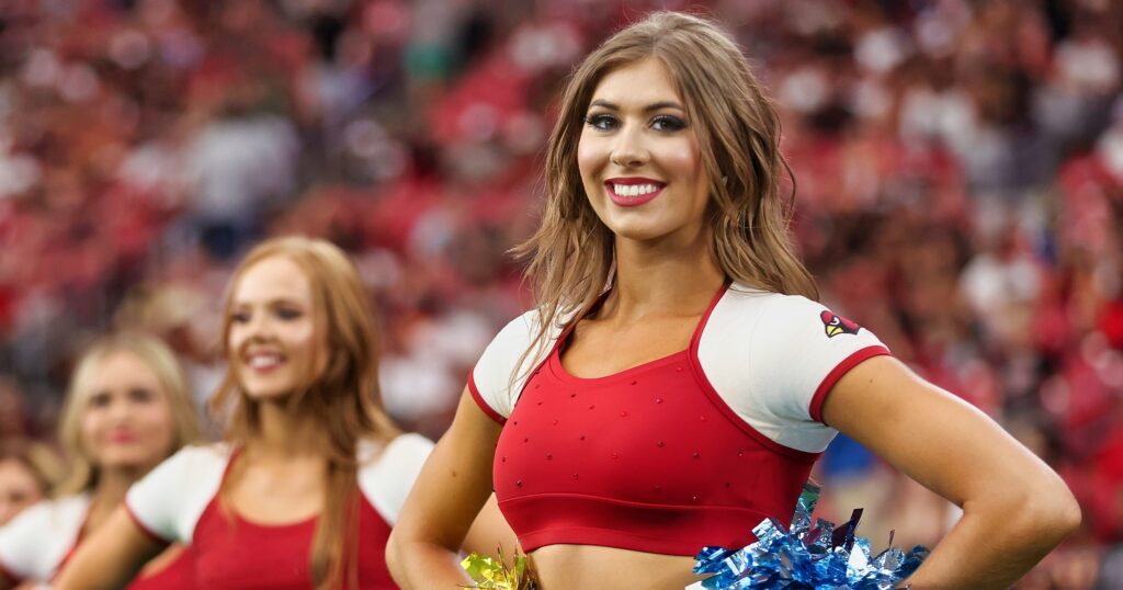 Arizona Cardinals cheerleader smiling for the camera.