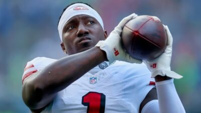 Deebo Samuel in uniform catching football