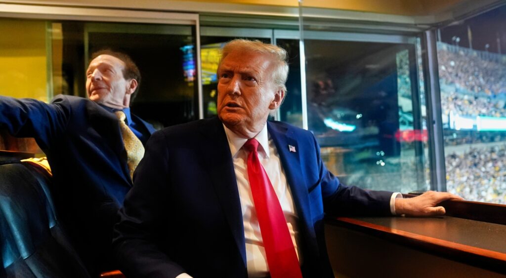 Donald Trump looking on at Steelers-Jets game.