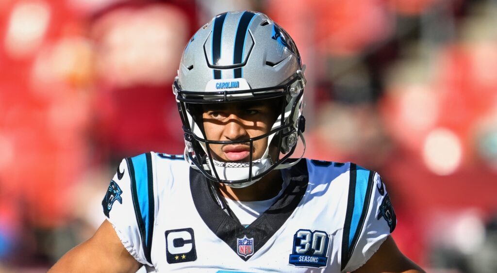 Bryce Young of Carolina Panthers looking on.