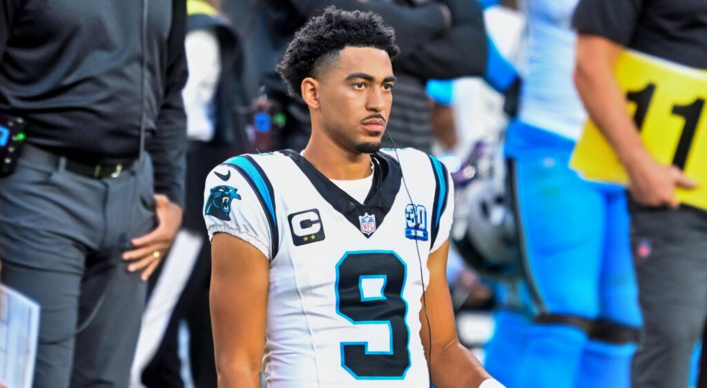 Bryce Young of Carolina Panthers looking on.