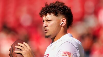 Patrick Mahomes holding football