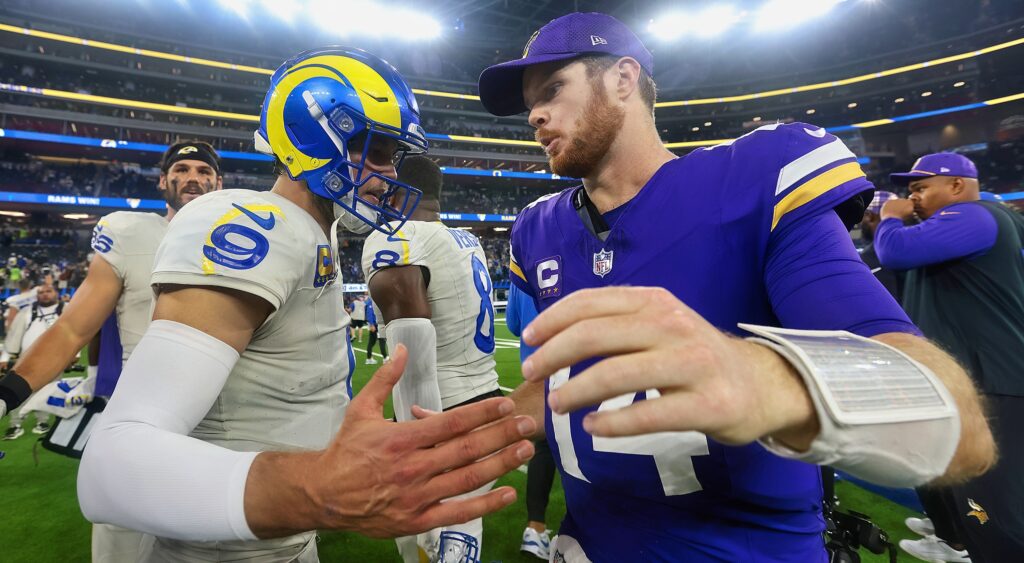 Sam Darnold and Matt Stafford greeting each other