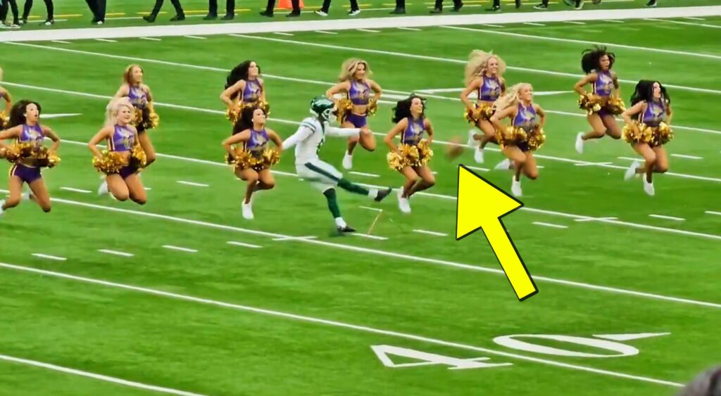 Greg Zuerlein practicing around Minnesota Vikings cheerleaders.