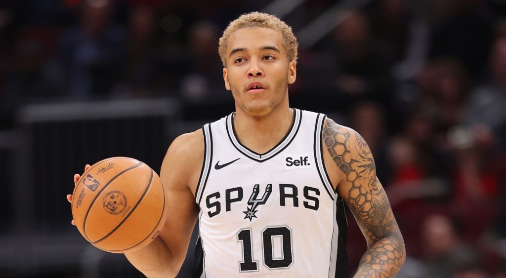 Jeremy Sochan of the San Antonio Spurs brings the ball upcourt during the first quarter of an NBA game