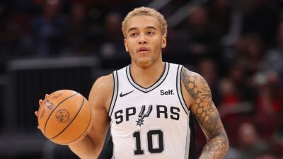 Jeremy Sochan of the San Antonio Spurs brings the ball upcourt during the first quarter of an NBA game