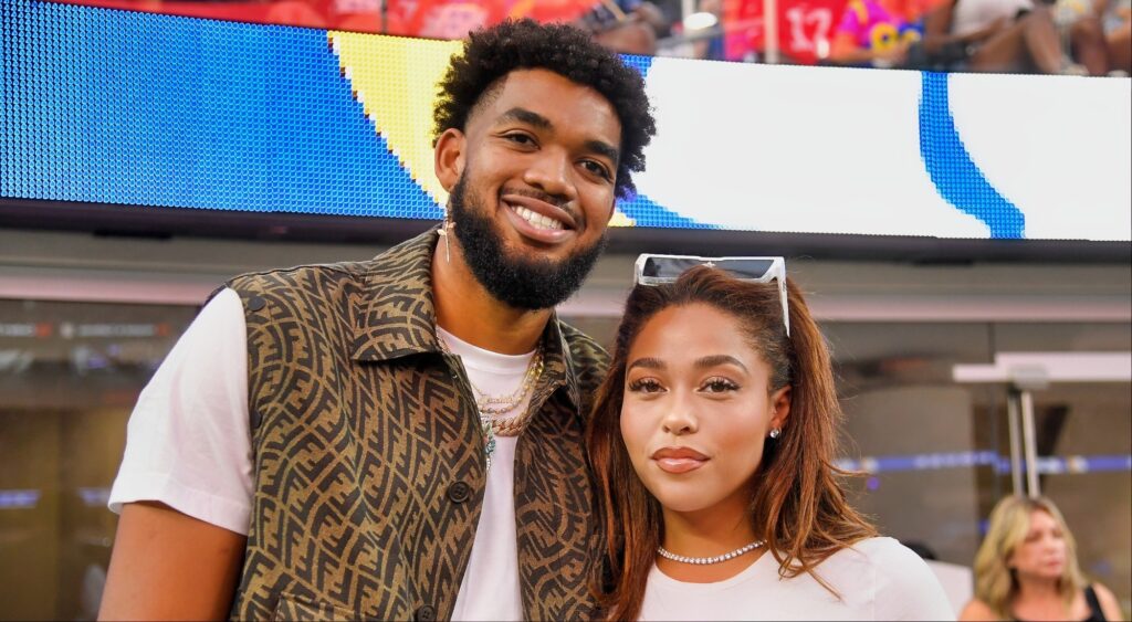 NBA athlete Karl-Anthony Towns and model Jordyn Woods attend the NFL game.