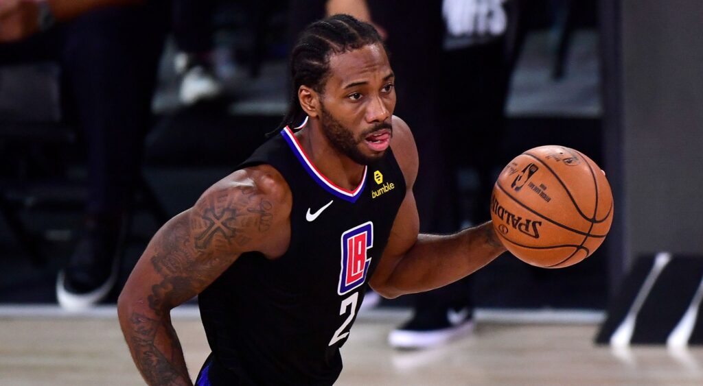 Kawhi Leonard of the LA Clippers dribbles the ball during a NBA match