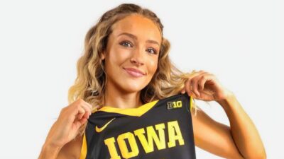 Kylie Feuerbach posing in Iowa jersey