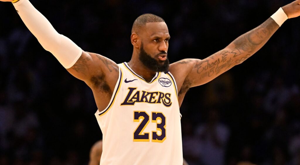 LeBron James of the Los Angeles Lakers asks for the crowd to quiet down 