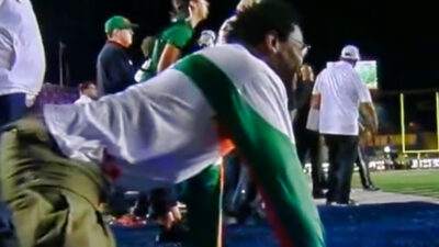 Michael Irvin on all fours during college football game