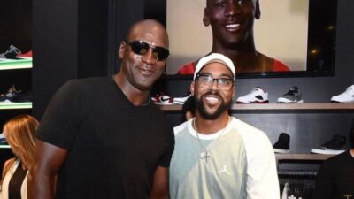 Michael Jordan posing with Marcus Jordan