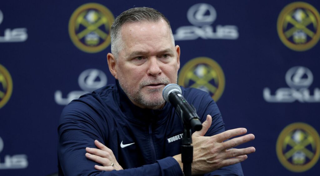 Head coach Michael Malone of the Denver Nuggets fields questions during Denver Nuggets Media Day