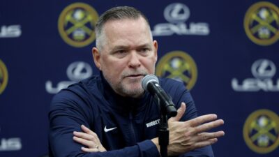 Head coach Michael Malone of the Denver Nuggets fields questions during Denver Nuggets Media Day