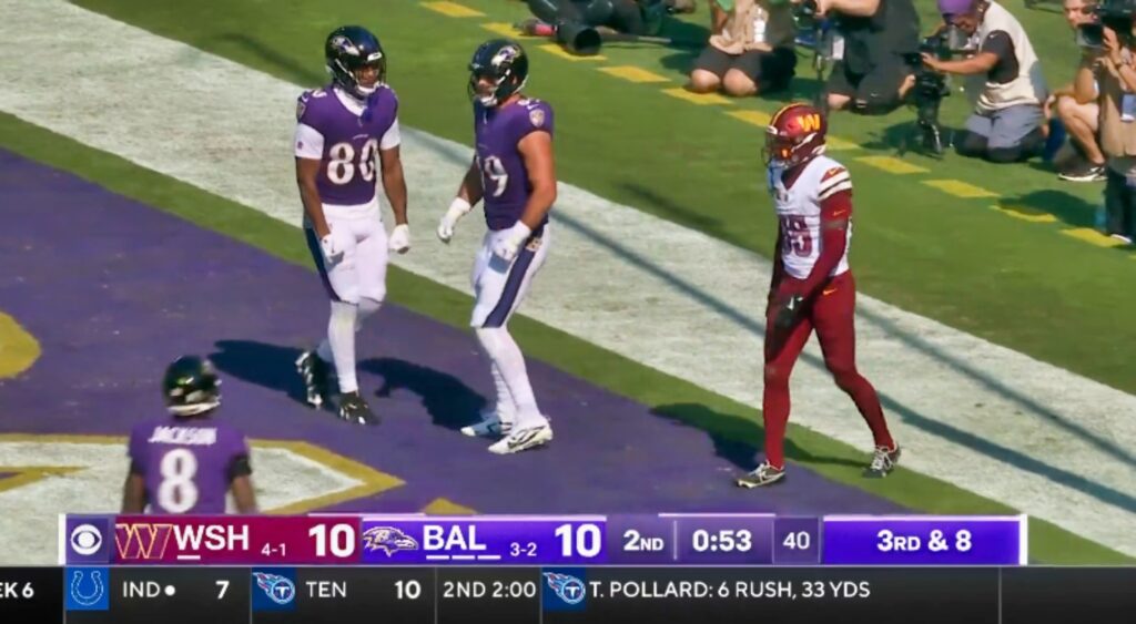 Percy Butler getting handsy with Lamar Jackson