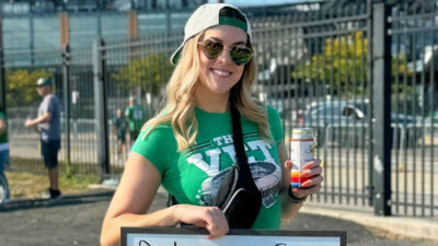 Philadelphia Eagles fan holding a sign