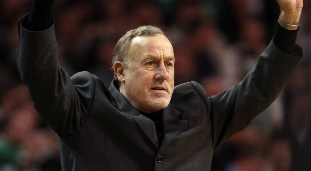 Head coach Rick Adelman signals a play