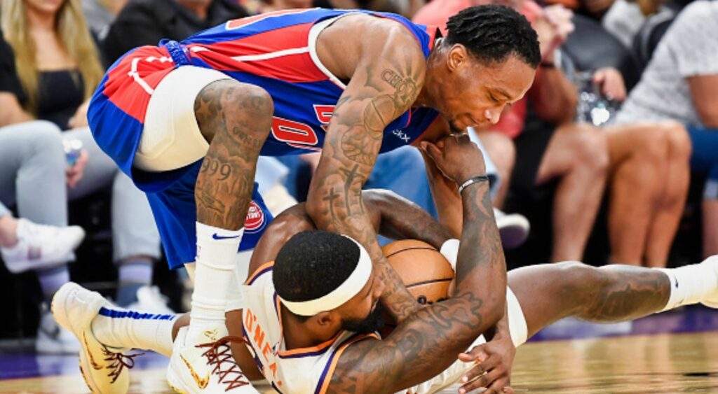 Royce O’Neale and Ron Holland engaged in a funny loose ball battle during a recent preseason game