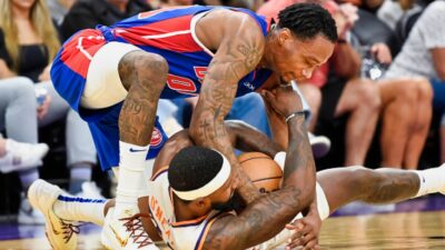 Royce O’Neale and Ron Holland engaged in a funny loose ball battle during a recent preseason game