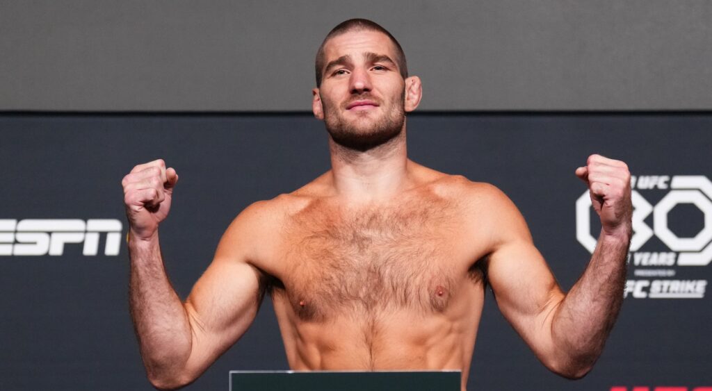 Sean Strickland posing before the media before UFC Fight Night