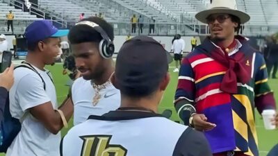 Shedeur Sanders and Cam Newton on he field