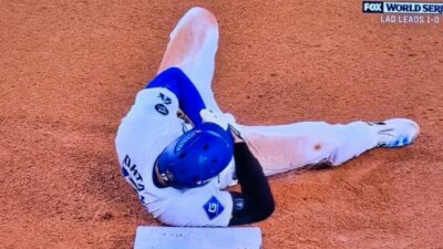 Shohei Ohtani lying on ground