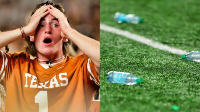 Texas Longhorns fan with a shocked reaction and bottles on field