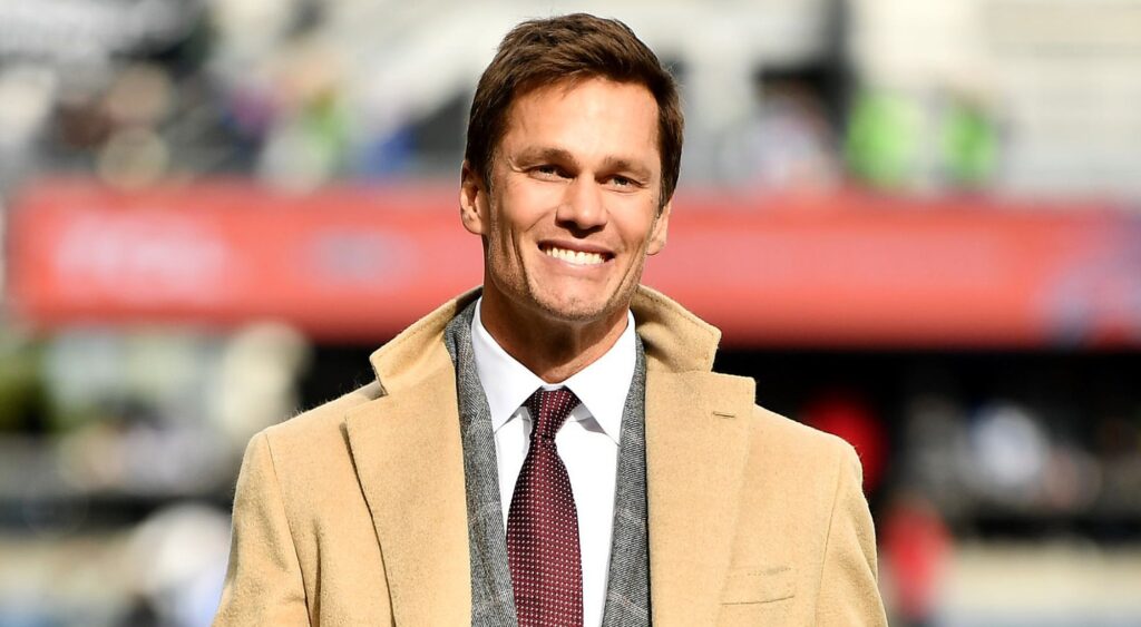 Tom Brady is seen on the field prior to a game between the Seattle Seahawks and the Buffalo Bills at Lumen Field on October 27, 2024